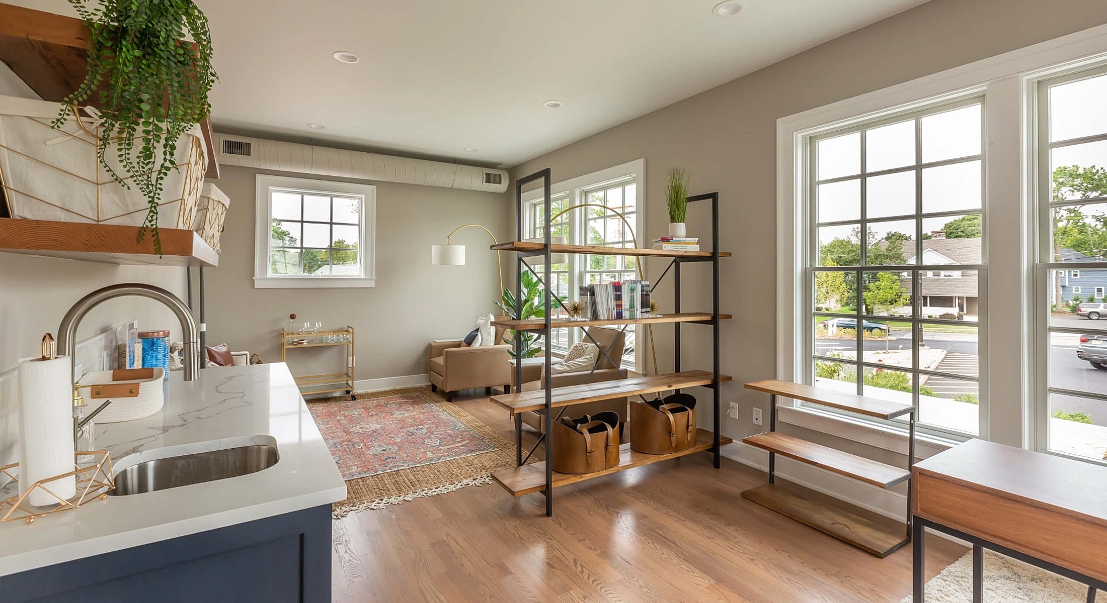 Modern living room with stylish shelving and decor.