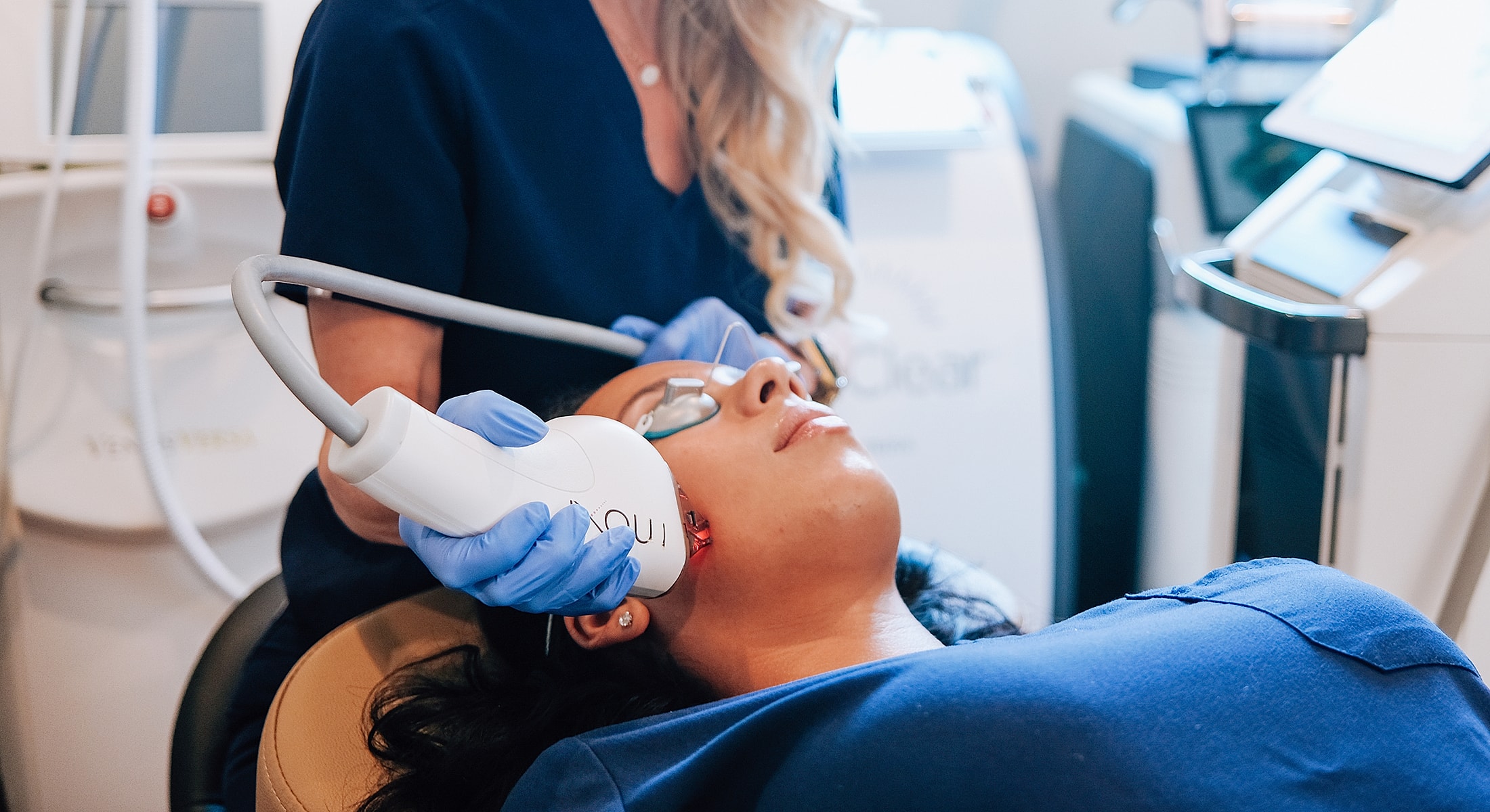 Facial treatment in a skincare clinic setting.